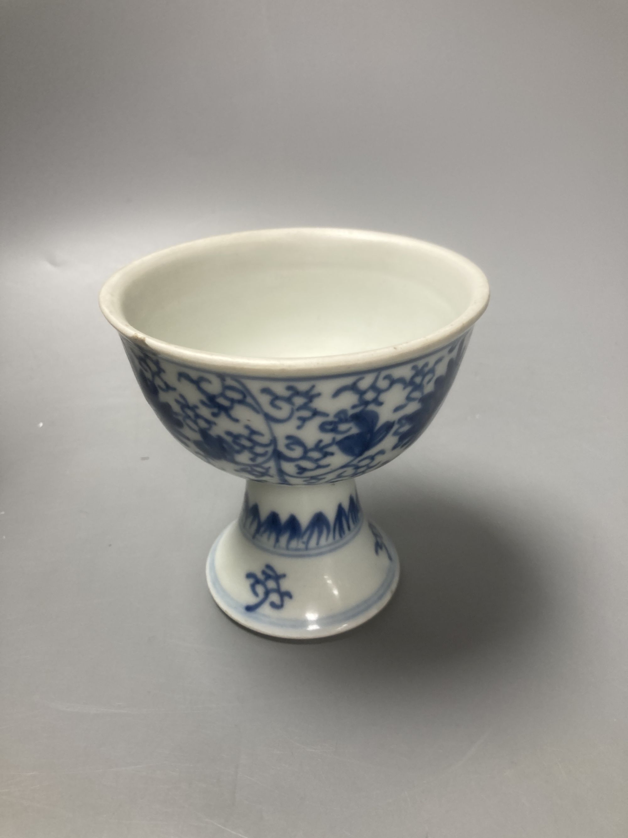 A Chinese pottery bottle, height 22cm, a cup and a vase